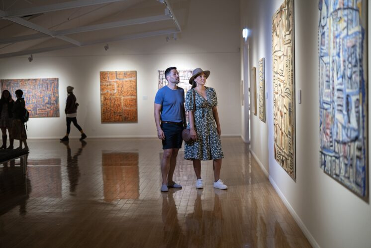 Couple enjoying an art exhibition at Araluen Art Centre